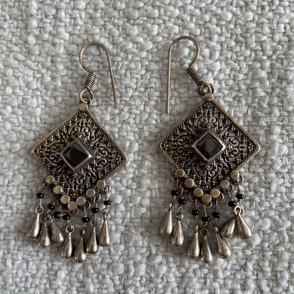 Beautiful heavy weighted dangling earrings